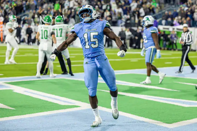 Tulane - Dec 5, 2025; New Orleans, LA, USA; Tulane Green Wave wide receiver Zycarl Lewis Jr. (15) reacts to a play against the North Texas Mean Green during the second half in the 2025 American Championship at Yulman Stadium. Mandatory Credit: Stephen Lew-Imagn Images