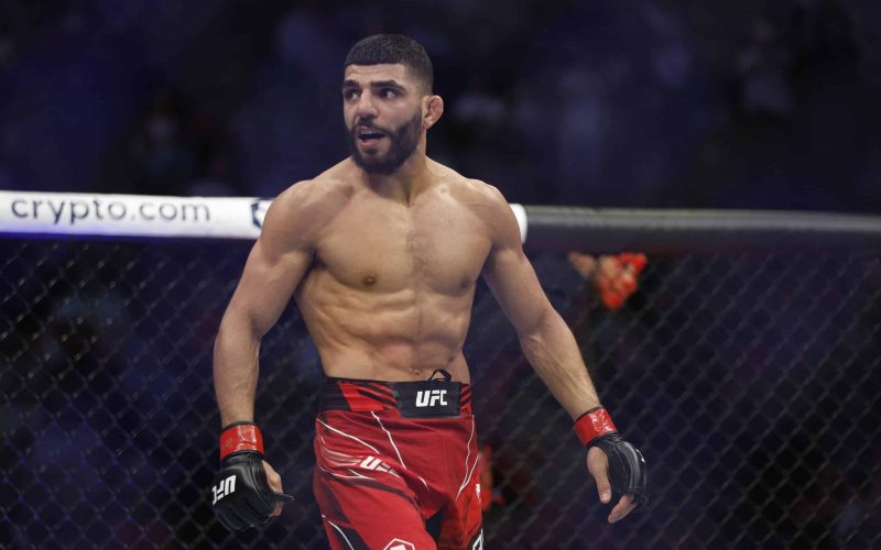 Aug 20, 2022; Salt Lake City, Utah, USA; Amir Albazi (red gloves) reacts after defeating Francisco Figueiredo (blue gloves) during UFC 278 at Vivint Arena. Mandatory Credit: Jeffrey Swinger-USA TODAY Sports