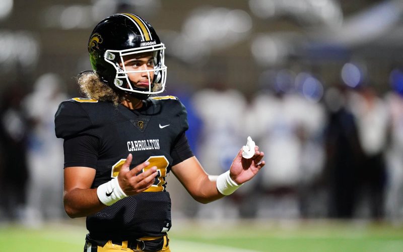 Oct 20, 2023; Carrollton, GA, USA; Carrollton Trojans quarterback Julian Lewis (10) reacts to a play against the Westlake Lions during the first half at Grisham Stadium. The 15-year-old Carrollton High student has already committed to playing for the University of Southern California Trojans and has been considered one of the top high school quarterback prospects. Mandatory Credit: John David Mercer-USA TODAY Sports