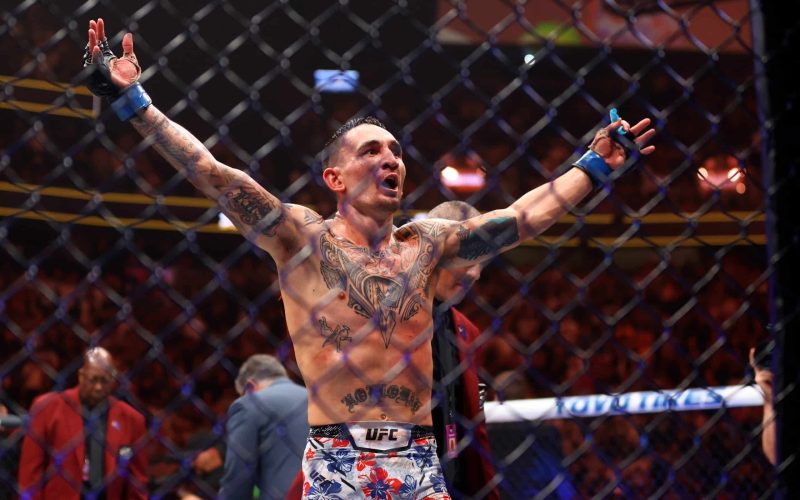 Apr 13, 2024; Las Vegas, Nevada, USA; Max Holloway celebrates after knocking out Justin Gaethje (not pictured) during UFC 300 at T-Mobile Arena. Mandatory Credit: Mark J. Rebilas-USA TODAY Sports