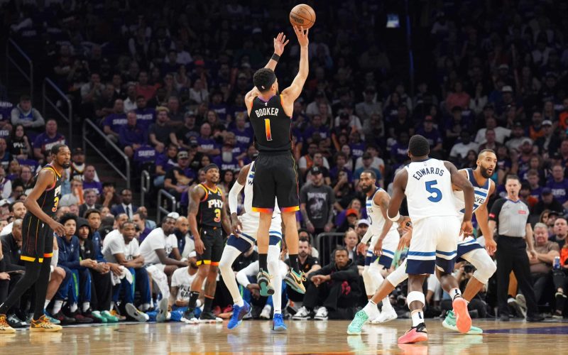 Apr 28, 2024; Phoenix, Arizona, USA; Phoenix Suns guard Devin Booker (1) shoots against the Minnesota Timberwolves during the first half of game four of the first round for the 2024 NBA playoffs at Footprint Center. Mandatory Credit: Joe Camporeale-USA TODAY Sports