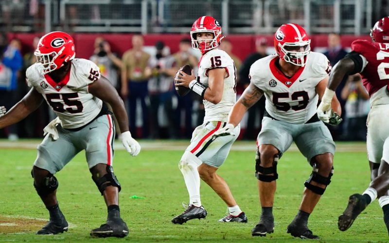 Sep 28, 2024; Tuscaloosa, Alabama, USA;  Georgia Bulldogs quarterback Carson Beck (15) drops back to throw against the Alabama Crimson Tide during the fourth quarter at Bryant-Denny Stadium. Mandatory Credit: John David Mercer-Imagn Images