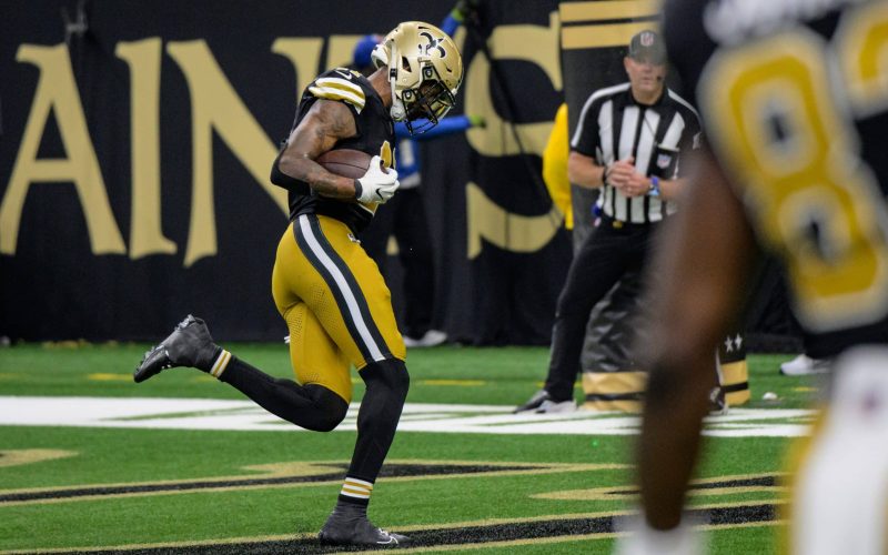 Oct 17, 2024; New Orleans, Louisiana, USA; New Orleans Saints wide receiver Cedrick Wilson Jr. (11) scores a touchdown late in the fourth quarter against the Denver Broncos at Caesars Superdome. Mandatory Credit: Matthew Hinton-Imagn Images