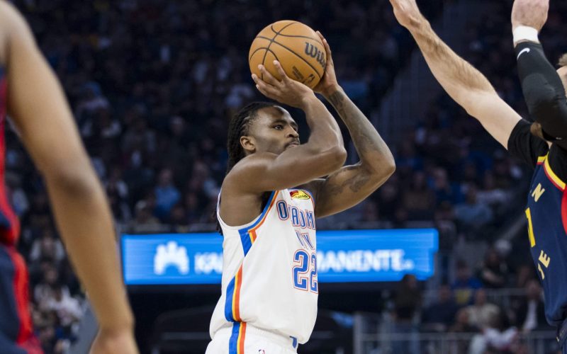 Nov 27, 2024; San Francisco, California, USA; Oklahoma City Thunder guard Cason Wallace (22) shoots against the Golden State Warriors during the first half at Chase Center. Mandatory Credit: John Hefti-Imagn Images