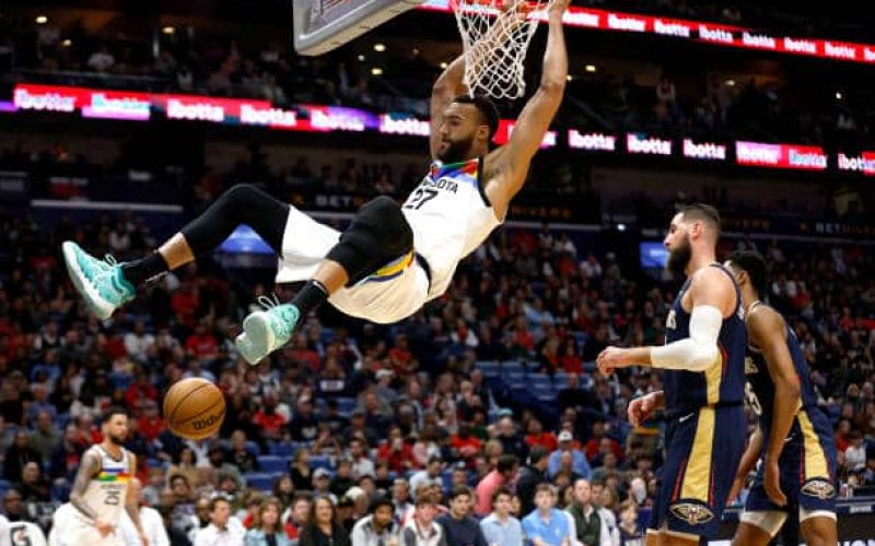 NEW ORLEANS, LOUISIANA - DECEMBER 28: Rudy Gobert #27 of the Minnesota Timberwolves dunks the ball during the first quarter of an NBA game against the New Orleans Pelicans at Smoothie King Center on December 28, 2022 in New Orleans, Louisiana. NOTE TO USER: User expressly acknowledges and agrees that, by downloading and or using this photograph, User is consenting to the terms and conditions of the Getty Images License Agreement. (Photo by Sean Gardner/Getty Images)