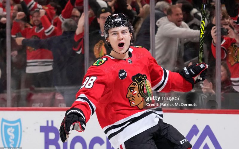 CHICAGO, ILLINOIS - DECEMBER 27: Connor Bedard #98 of the Chicago Blackhawks celebrates after scoring the game winning goal during overtime against the Winnipeg Jets at the United Center on December 27, 2023 in Chicago, Illinois. (Photo by Patrick McDermott/Getty Images)