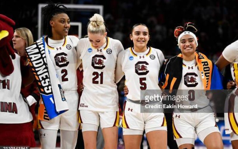 COLUMBIA, SOUTH CAROLINA - MARCH 24: Ashlyn Watkins #2, Chloe Kitts #21, Tessa Johnson #5, and Te-Hina Paopao #0 of the South Carolina Gamecocks stand on the court after their win over the North Carolina Tar Heels during the second round of the NCAA Women’s Basketball Tournament at Colonial Life Arena on March 24, 2024 in Columbia, South Carolina. (Photo by Eakin Howard/Getty Images)