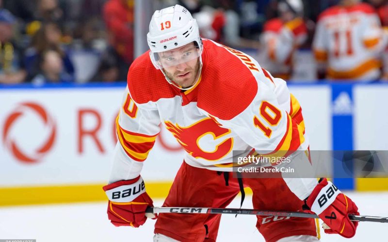 VANCOUVER, CANADA - APRIL 16: Jonathan Huberdeau #10 of the Calgary Flames waits for a face-off during the second period of their NHL game against the Vancouver Canucks at Rogers Arena on April 16, 2024 in Vancouver, British Columbia, Canada. (Photo by Derek Cain/Getty Images)