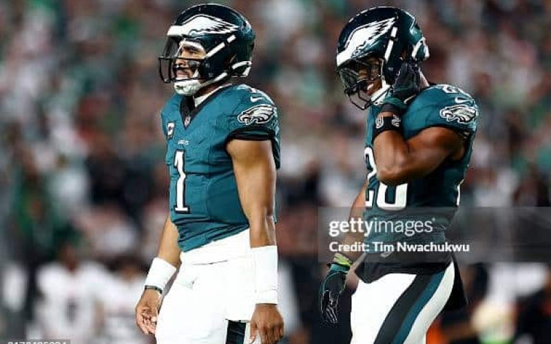 PHILADELPHIA, PENNSYLVANIA - SEPTEMBER 16: Jalen Hurts #1 and Saquon Barkley #26 of the Philadelphia Eagles walk off the field against the Atlanta Falcons during the first quarter in the game at Lincoln Financial Field on September 16, 2024 in Philadelphia, Pennsylvania. (Photo by Tim Nwachukwu/Getty Images)