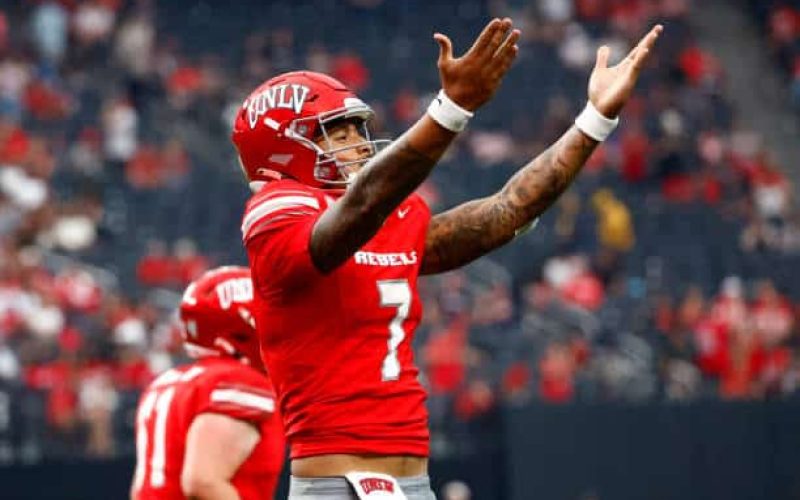 LAS VEGAS, NV - SEPTEMBER 28: Quarterback Cameron Friel (7) of the UNLV Rebels celebrates after scoring a touchdown during a Mountain West Conference game between the Fresno State Bulldogs and the UNLV Rebels on September 28, 2024 at Allegiant Stadium in Las Vegas, Nevada. (Photo by Jeff Speer/Icon Sportswire via Getty Images)